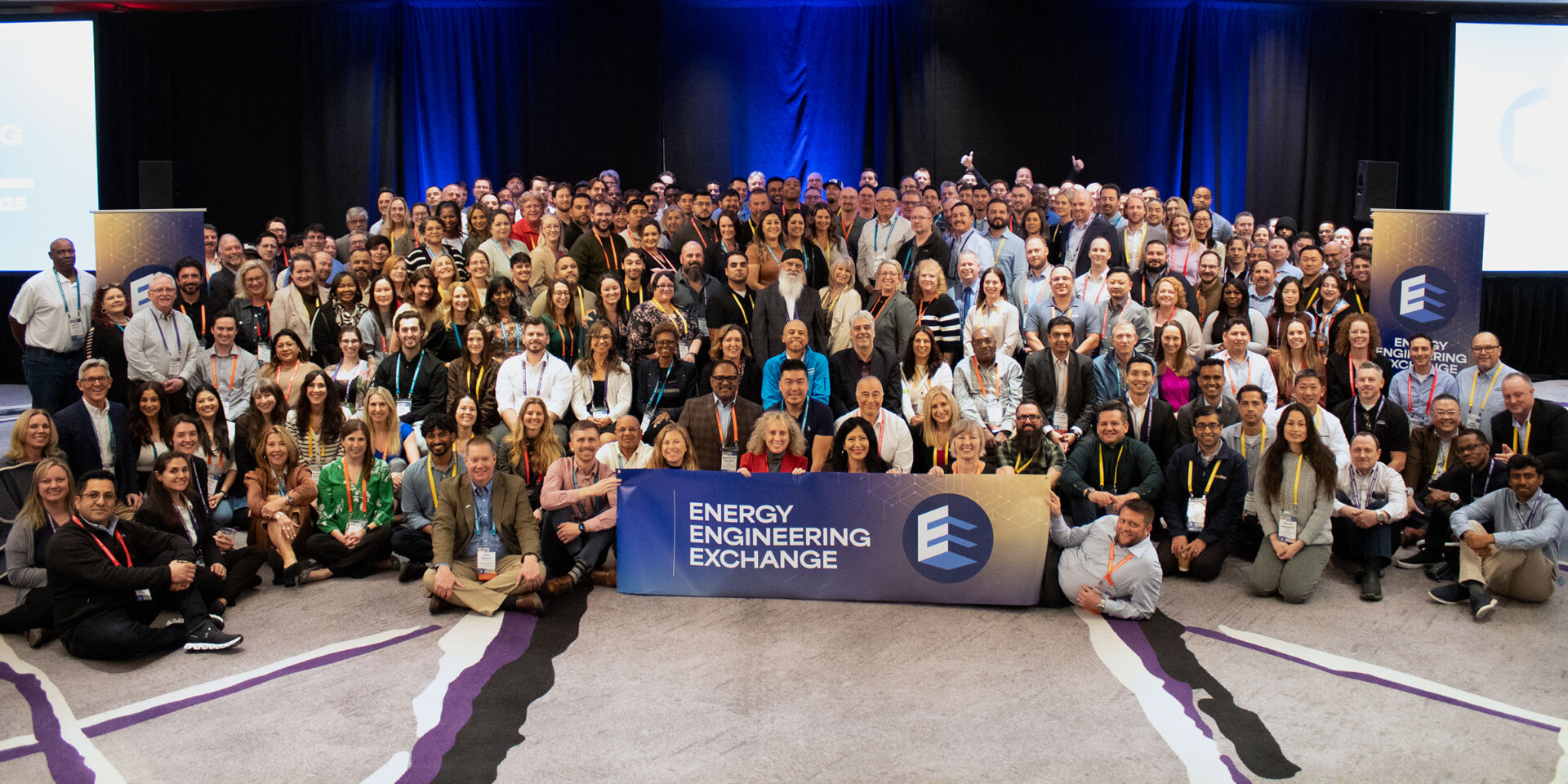 200+ OPTERRA employees posing for a group photo at our annual company conference
